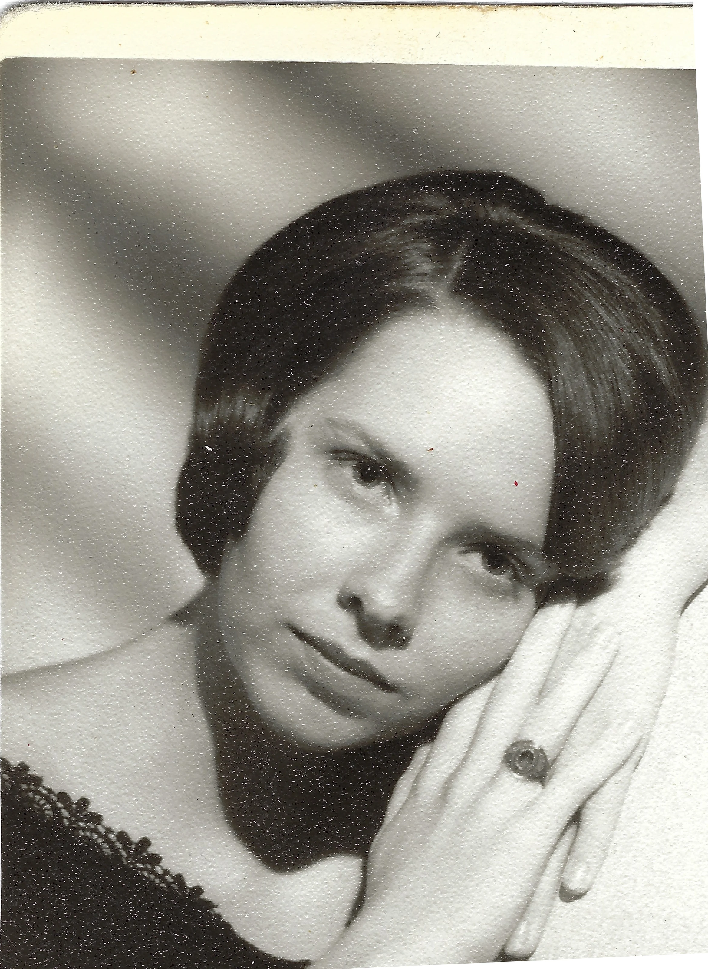 A soft-focus glamour portrait of Cacky (b.1947) resting her cheek on her hand, a ring on her finger, around 1964
