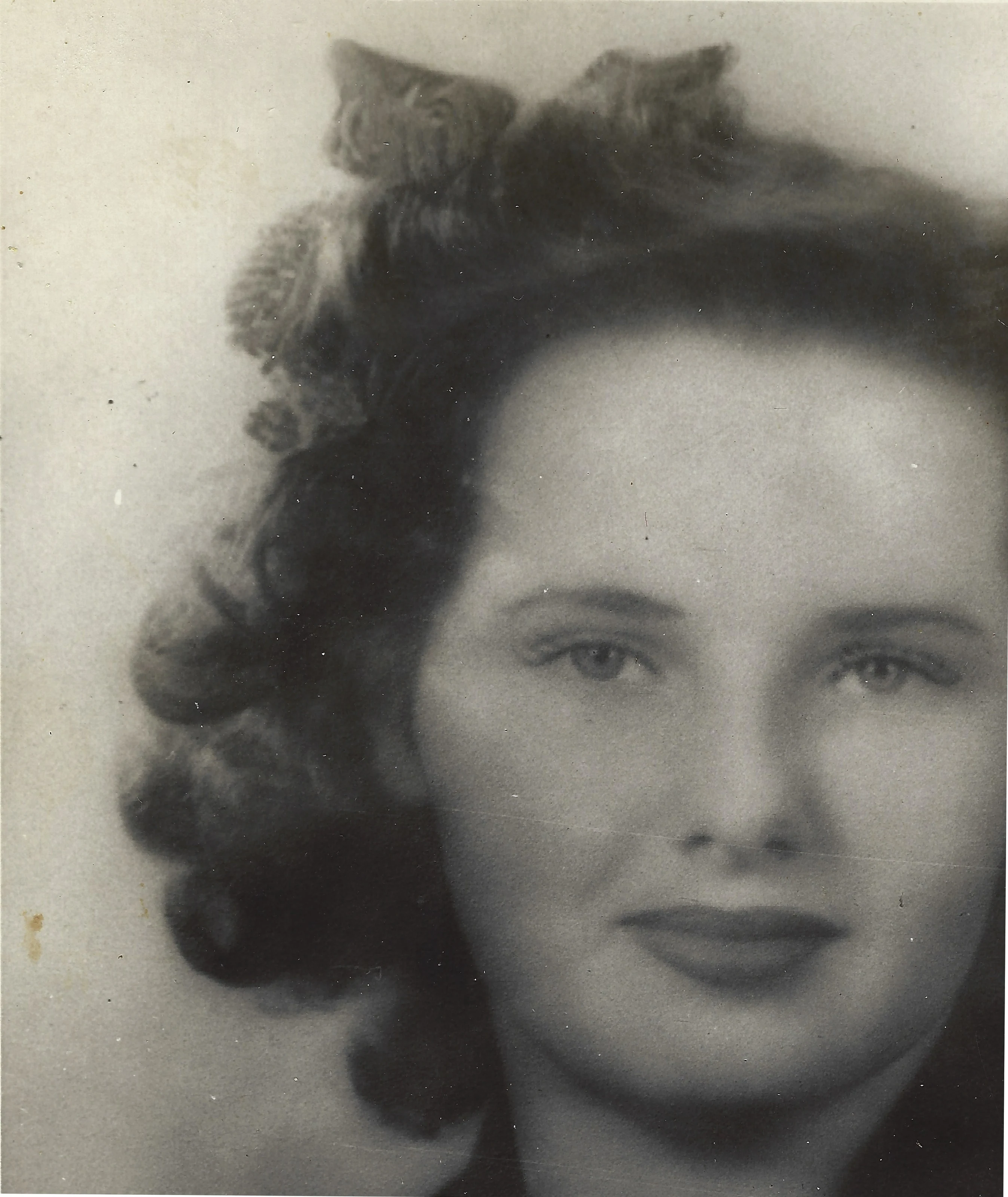 A soft-focus 1940s portrait of Gruzel (b.1924) as a young woman with curled hair, around 1943