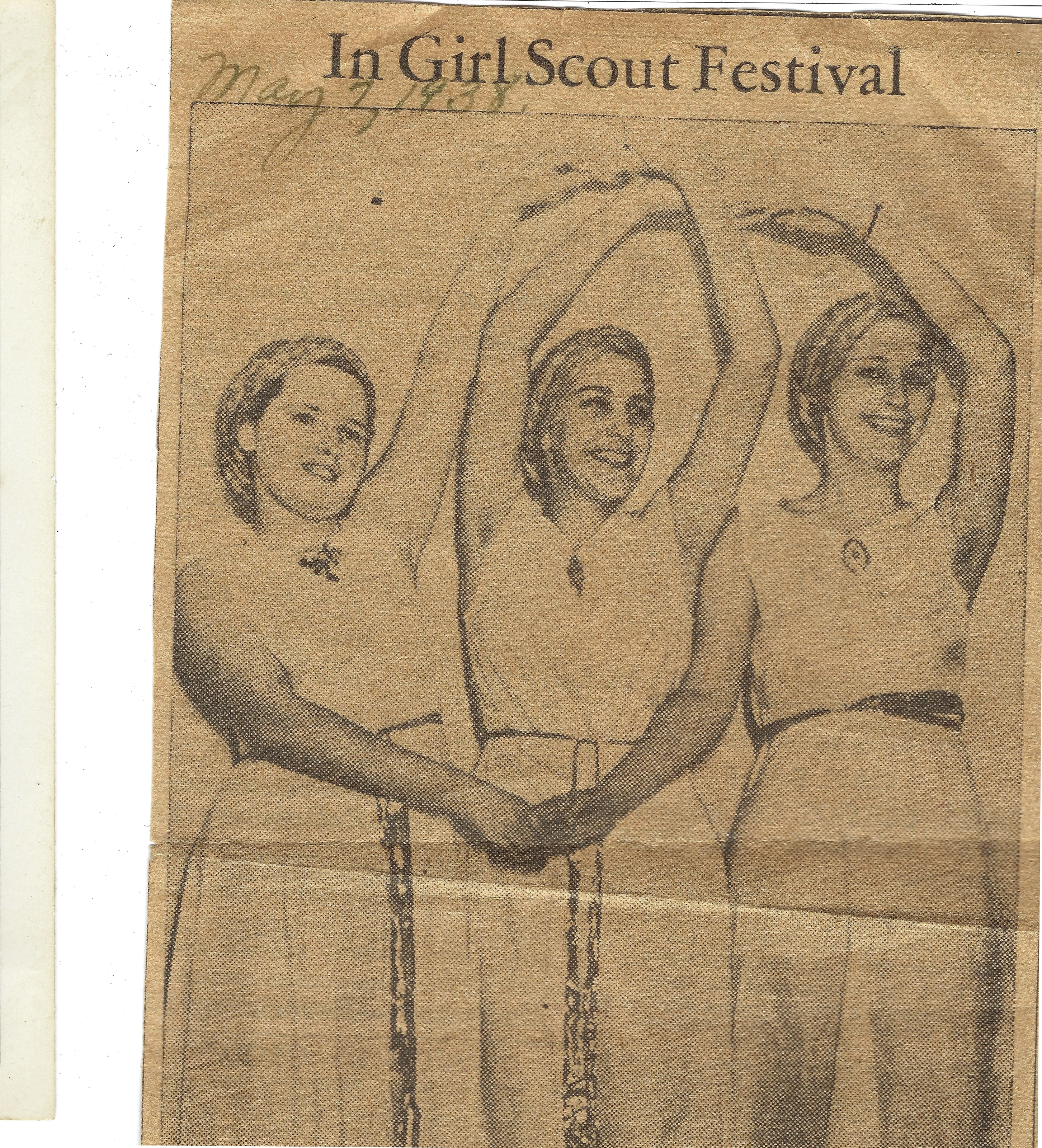 A 1938 newspaper clipping headlined 'In Girl Scout Festival' showing three girls in a synchronized arms-raised pose, Gruzel (b.1924) among them
