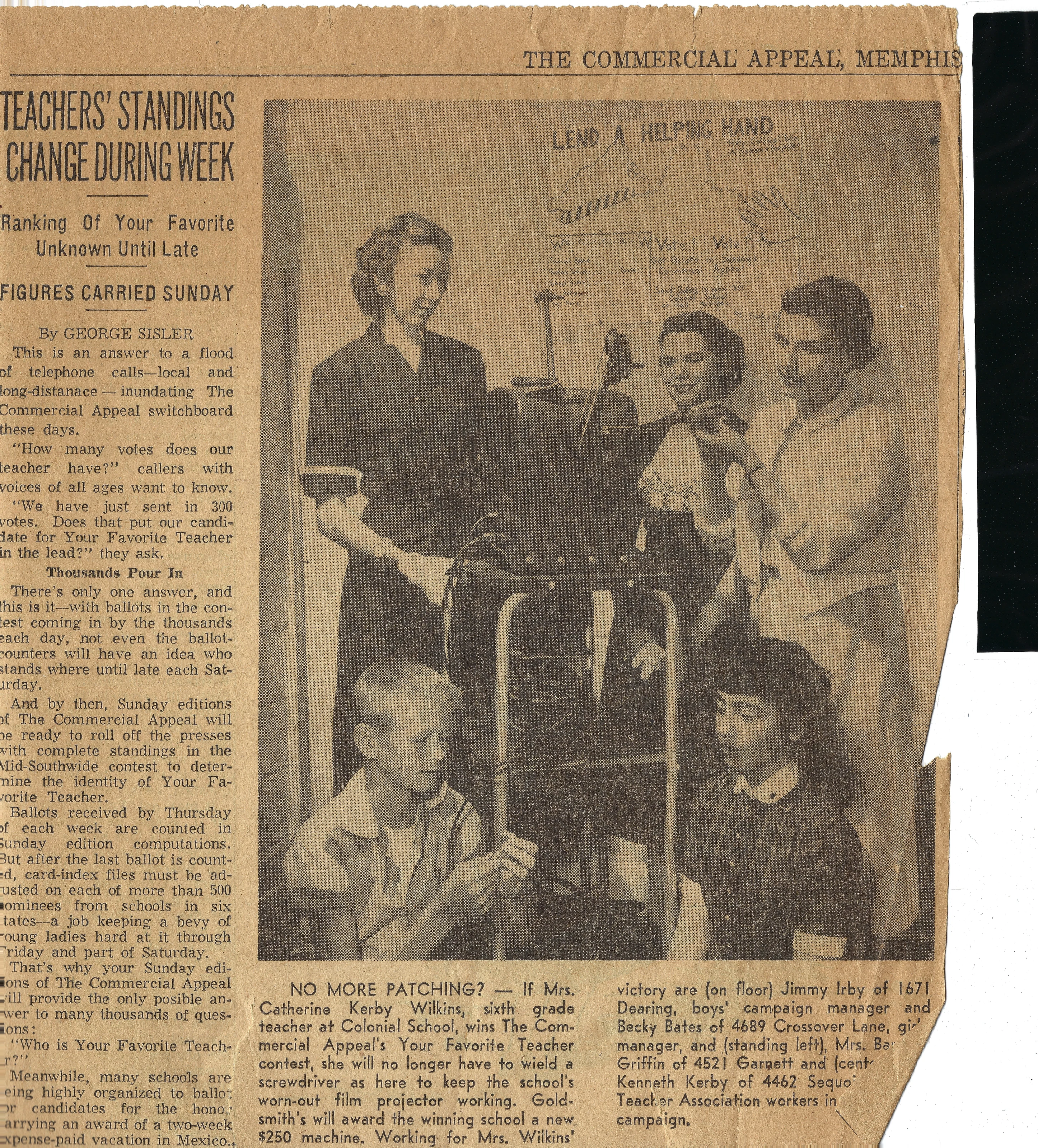 A 1960s newspaper photograph of Gruzel (Mrs. Wilkins) with a group of her students around a desk, kept in her collection