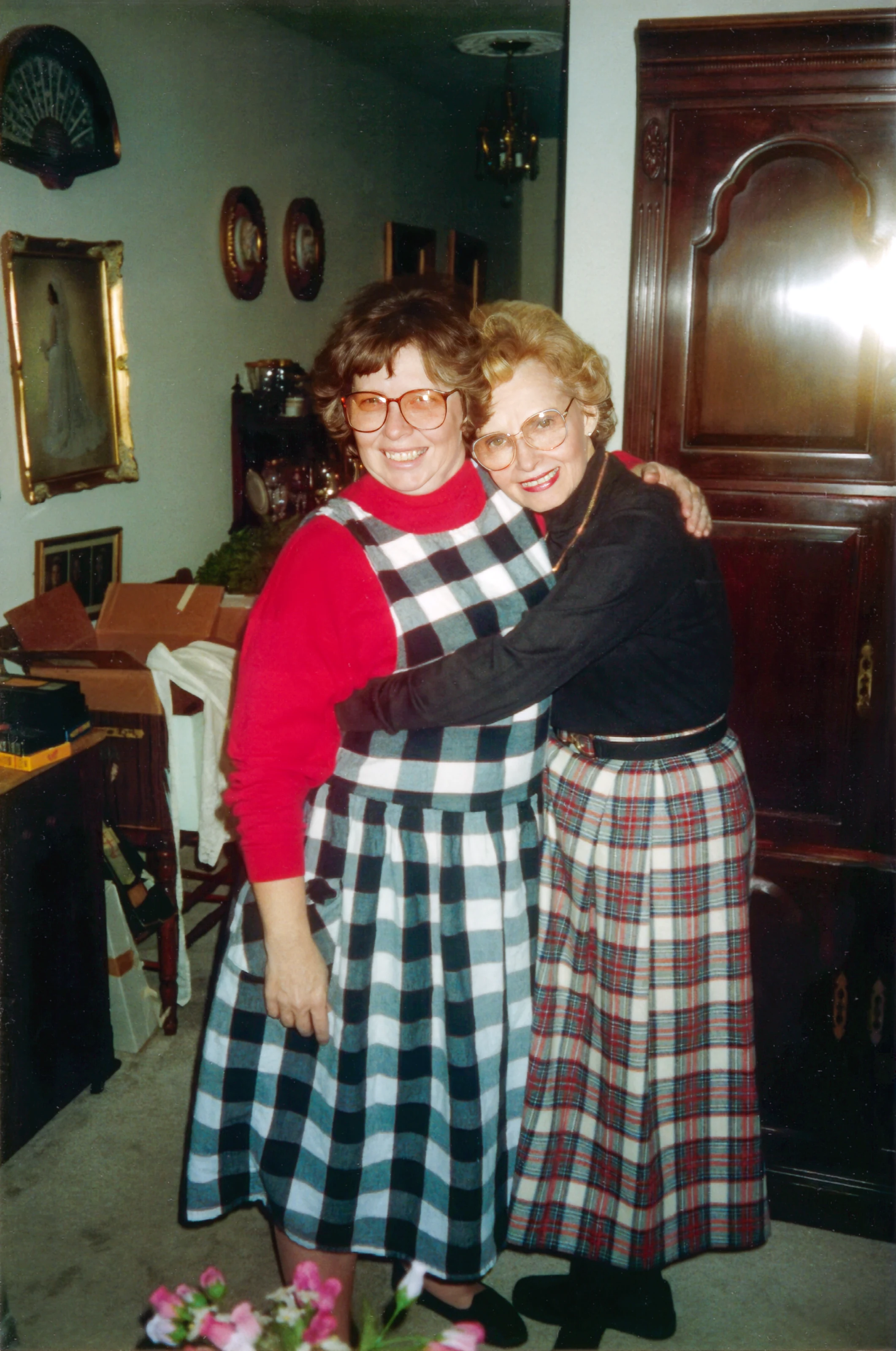 Cacky and Gruzel hug in matching plaid outfits in 1994